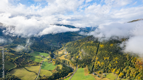Autumn clouds above Norwegian contryside photo