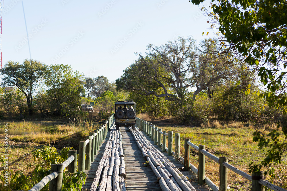 Safari vehicle crossing Fourth Bridge, Okavango Delta, Botswana. Safari vehicle crossing Fourth Bridge, Okavango Delta, Botswana.