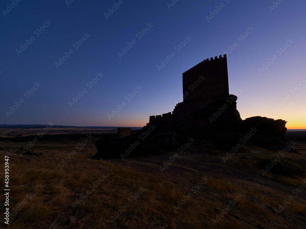 Silhouette of Zafra castle at sunset, Spain