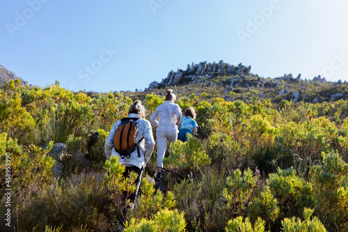 Family hiking a nature trail, Phillipskop nature reserve, Stanford, South Africa.