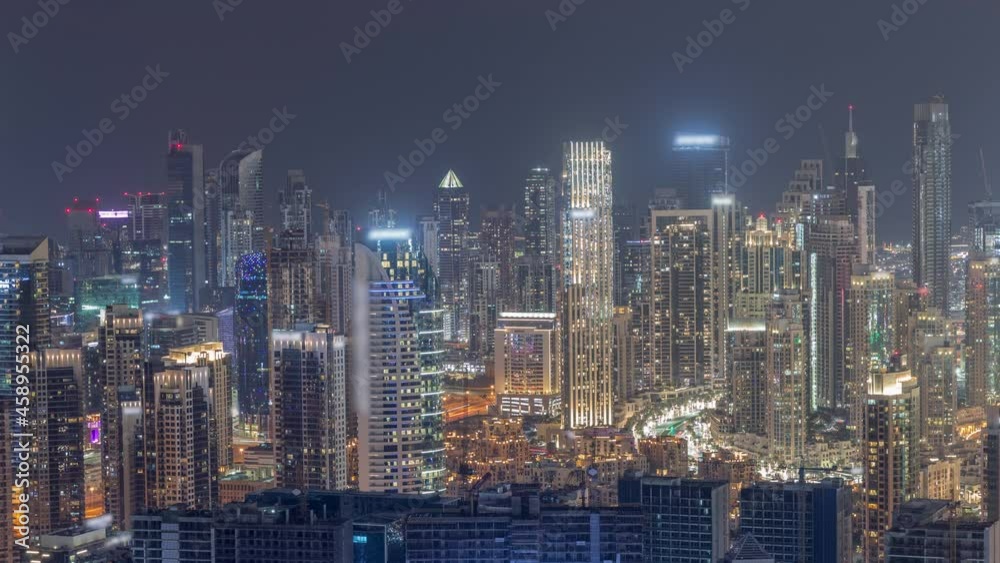 Panoramic skyline of Dubai with business bay and downtown district night timelapse. Panoramic skyline of Dubai with business bay and downtown district night timelapse.