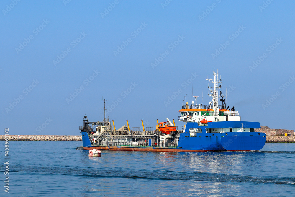Berth in Baltiysk. Vessel for dredging in the Baltic Sea