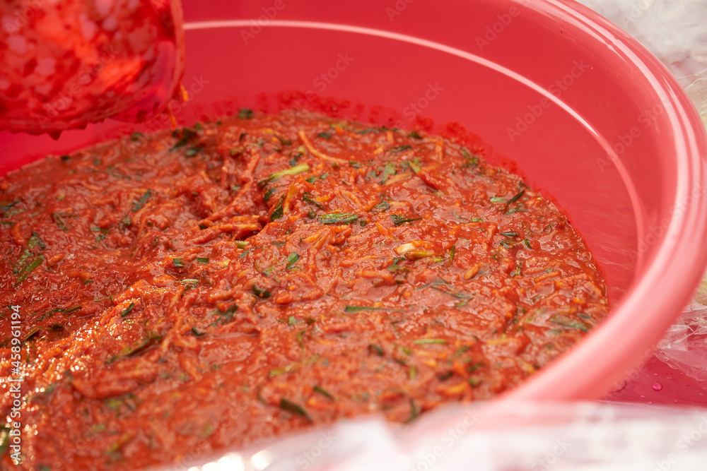 Making cabbage kimchi, cabbage mixed with seasoning Making cabbage kimchi, cabbage mixed with seasoning