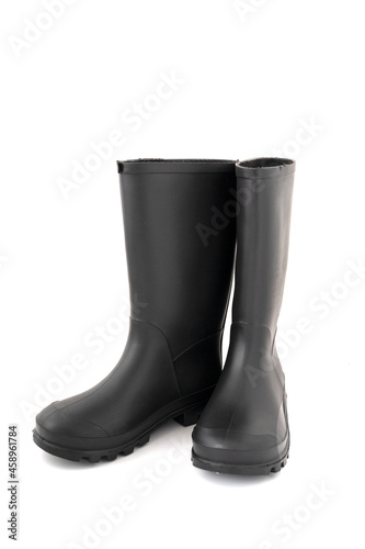 Pair of black high rubber boots, rain boots isolated on white