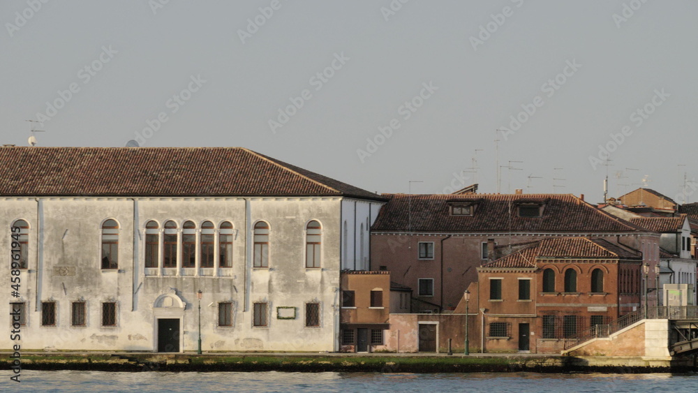 Houses by water in Venice, Italy, View from sailing boat