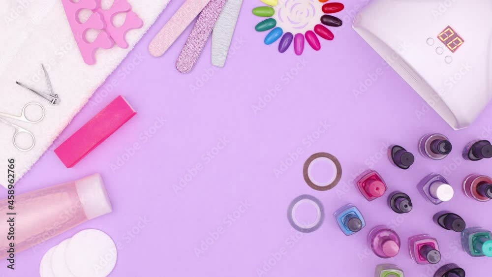 Manicure skin care set ordering on purple theme and UV lamp turn on. Stop motion