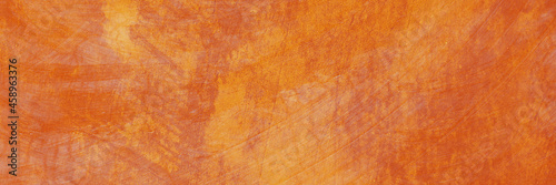 Orange Cement concrete wall texture abstract. Interior material construction blank for old backdrop building. Retro wallpaper grunge background. 
