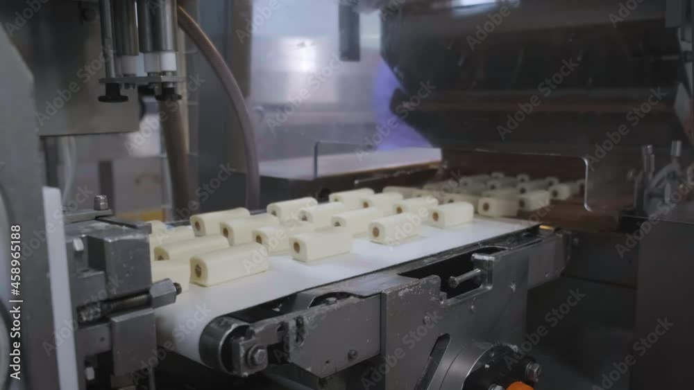 The process of cutting the curd mass into pieces The process of cutting the curd mass into pieces