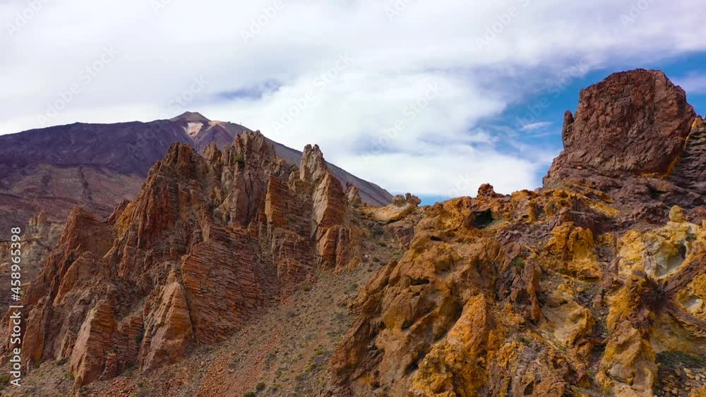 Aerial view of the Teide National Park, flight over a desert rocky surface, view of the mountains. Mars surface concept. Tenerife, Canary Islands Aerial view of the Teide National Park, flight over a desert rocky surface, view of the mountains. Mars surface concept. Tenerife, Canary Islands
