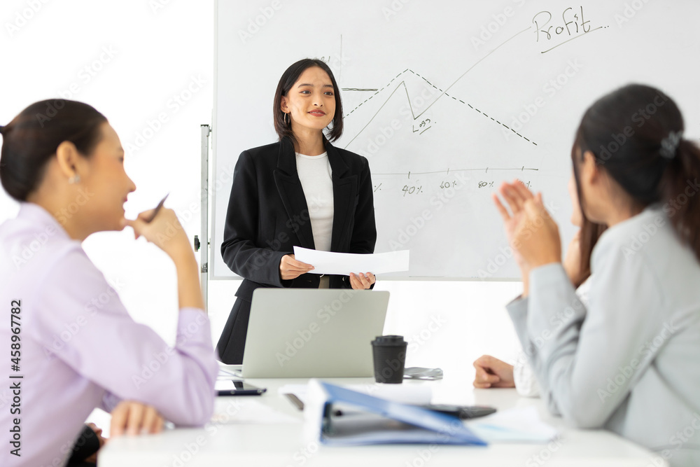 young businesswoman seminar or meeting and presentation about work project on whiteboard young businesswoman seminar or meeting and presentation about work project on whiteboard