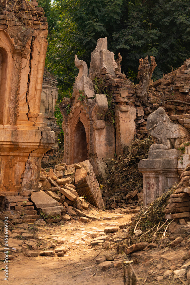 Ancient red brick stupas and pagodas, practically in ruins, in Nyaung Ohak, near Shwe Indein Pagoda, Shan State, Myanmar, Burma Ancient red brick stupas and pagodas, practically in ruins, in Nyaung Ohak, near Shwe Indein Pagoda, Shan State, Myanmar, Burma