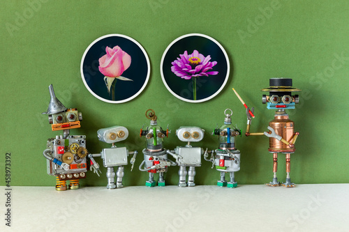 Robot teacher guide leads an educational excursion tour in the gallery. A group of robotics students listen to a lecture. Flowers photo exhibition exposition. Machine learning, artificial intelligence photo