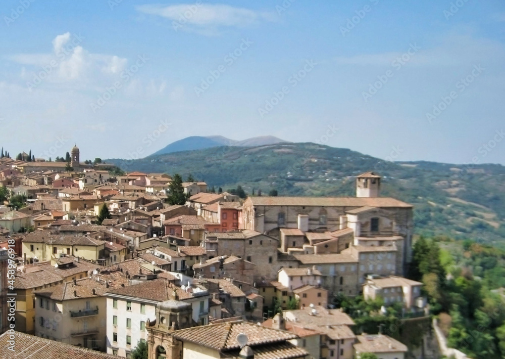 View of the rooftops in the historic center of Perugia. Mountains in the background. Umbria. Italy. Europe	