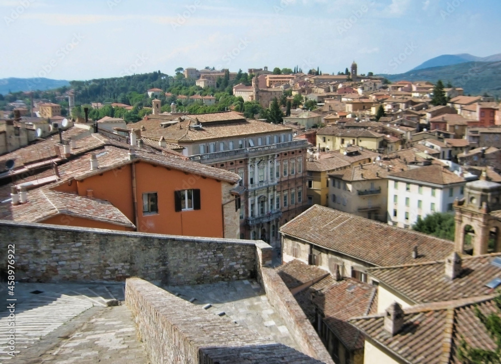 View of the rooftops in the historic center of Perugia. Mountains in the background. Umbria. Italy. Europe	
