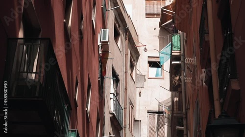 view of the neighborhood of the old city of Barcelona from a residential attic.	
