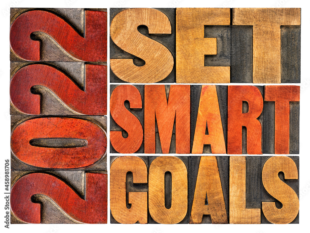 2022 set smart goals concept - isolated word abstract in vintage letterpress wood type, goal setting for New Year 2022 set smart goals concept - isolated word abstract in vintage letterpress wood type, goal setting for New Year