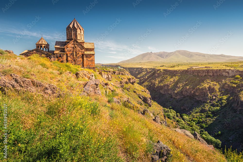 Hovhannavank monastery and church on the edge of a scenic Kasakh gorge and canyon. Tourist and religious destinations and attractions in Armenia