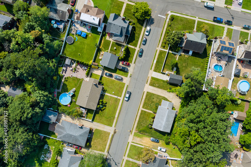 Fototapeta Naklejka Na Ścianę i Meble -  Aerial view of small streets residential area a small town in Sayreville New Jersey