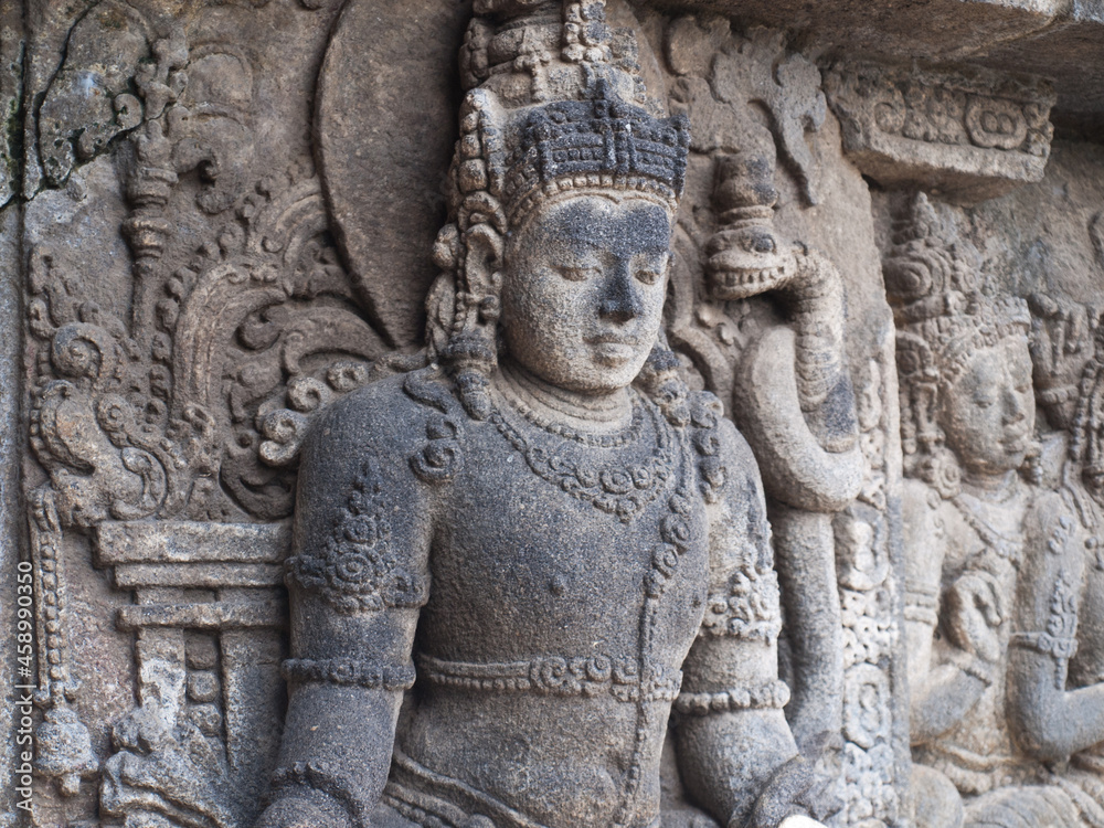 Stone carving detail from the Prambanan temples Stone carving detail from the Prambanan temples