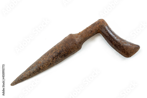 Old iron dibber for planting bulbs, seedlings and seeds ,old rusty tool, on white.