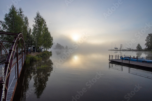 Early morning. Fog on the river. Beautiful sunrise in the summer by the river. Mystical morning on the river