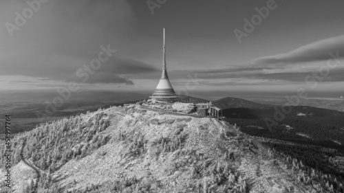 Black and white Ještěd photographed from a drone in Czech republic.
