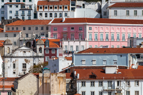 Building facades in the center of Lisbon fill the urban scene with historic and traditional architecture.