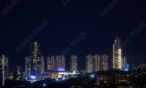 Beautiful cityscape of Ankara at night. Distant photo of Oran district with skyscrapers.. 
