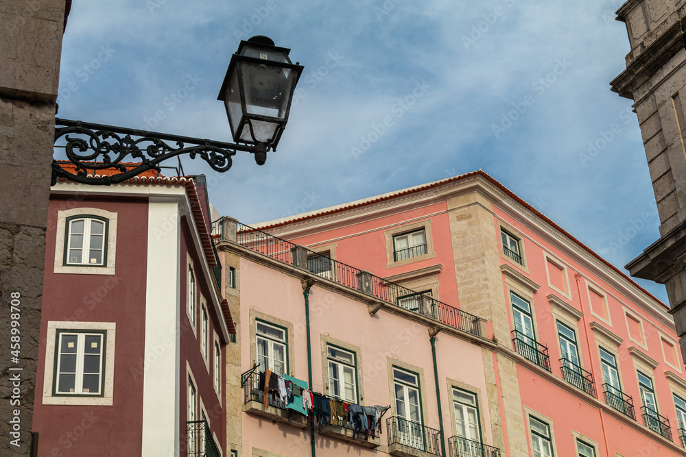 Lisbon, Portugal - March 12, 2018: Building facades in the center of Lisbon fill the urban scene with historic and traditional architecture.