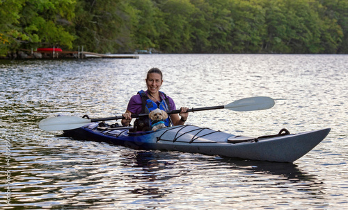 Kayaker with small dog
