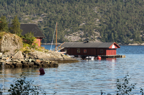 colorful wooden houses on the sea in Osoyro in Norway photo