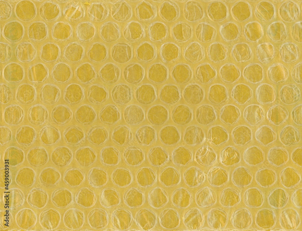 yellow bubble wrap plastic and paper texture background yellow bubble wrap plastic and paper texture background