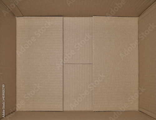 Empty cardboard box for packing goods. View from above. © Igor