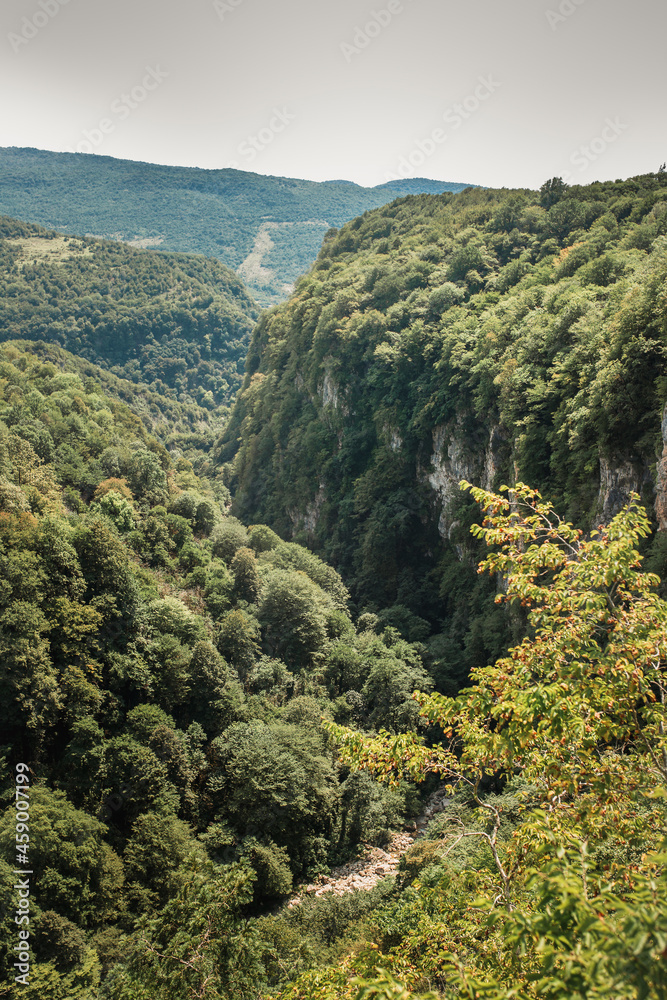 A breathtaking view from a high vantage point on a majestic mountain landscape - a trip in the mountains