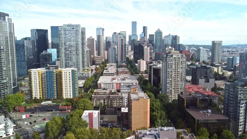 Seattle downtown aerial - drone flight over buildings of Seatlle city (USA, Washington) near Space Needle park photo