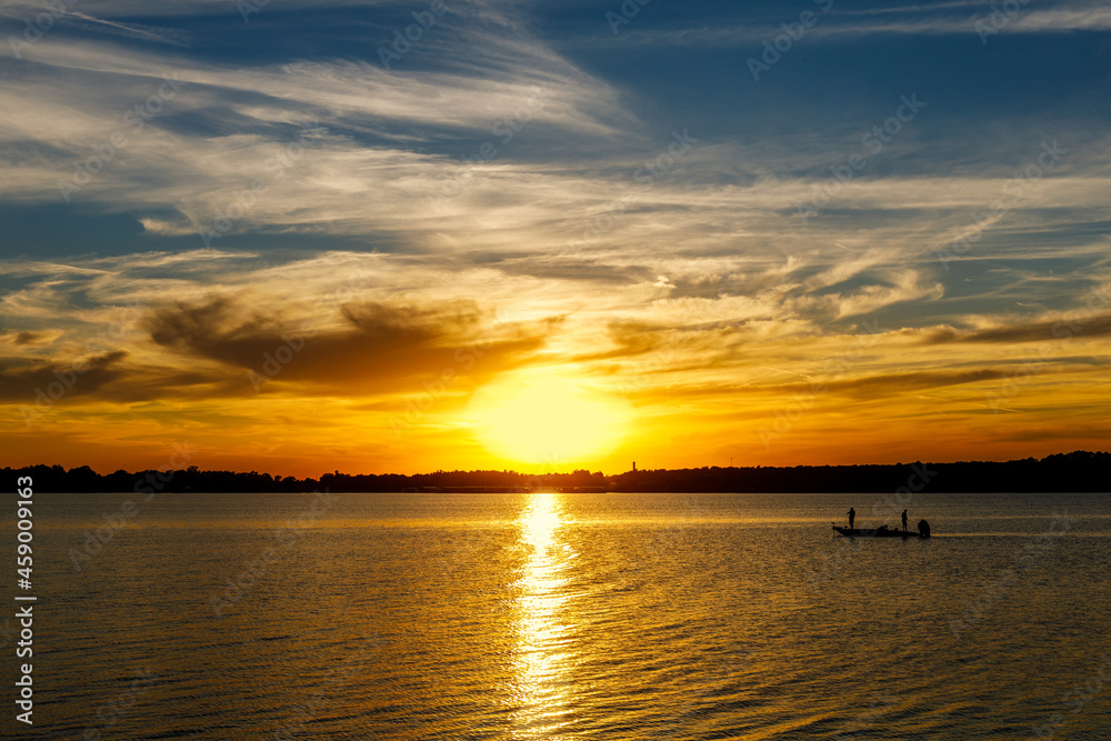 Sunset over a lake. Sunset over a lake.