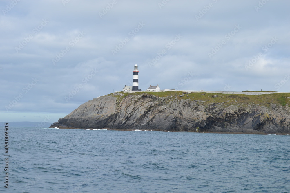 Atlantic Ocean. West Cork. Ireland. Rocks. Cliffs.  Lighthouse. Beacon.