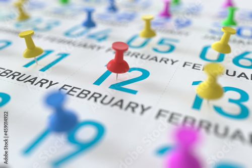February 12 date marked with red pushpin on a calendar, 3D rendering