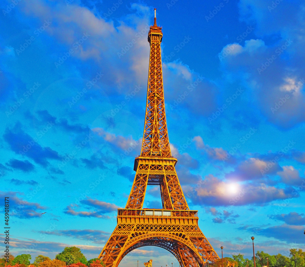 view of the Eiffel tower on a bright sunny day. Famous tourist place.