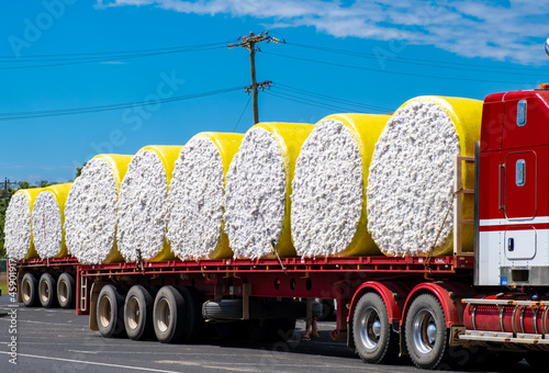 Large bales of cotton strapped to a truck for transport in North Queensland, Australia near Atherton.