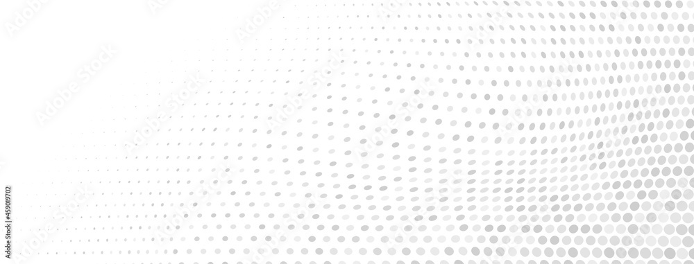 Abstract halftone background made of small round dots of different sizes in gray and white colors Abstract halftone background made of small round dots of different sizes in gray and white colors