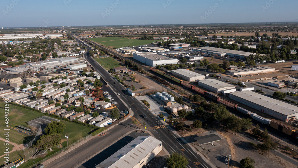 Sunset aerial view of the Central Valley city of Manteca, California, USA. - obrazy, fototapety, plakaty 