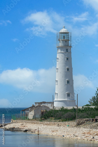 Seascape with a view of the white lighthouse