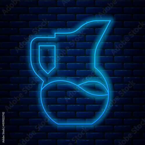 Glowing neon line Milk jug or pitcher icon isolated on brick wall background. Vector