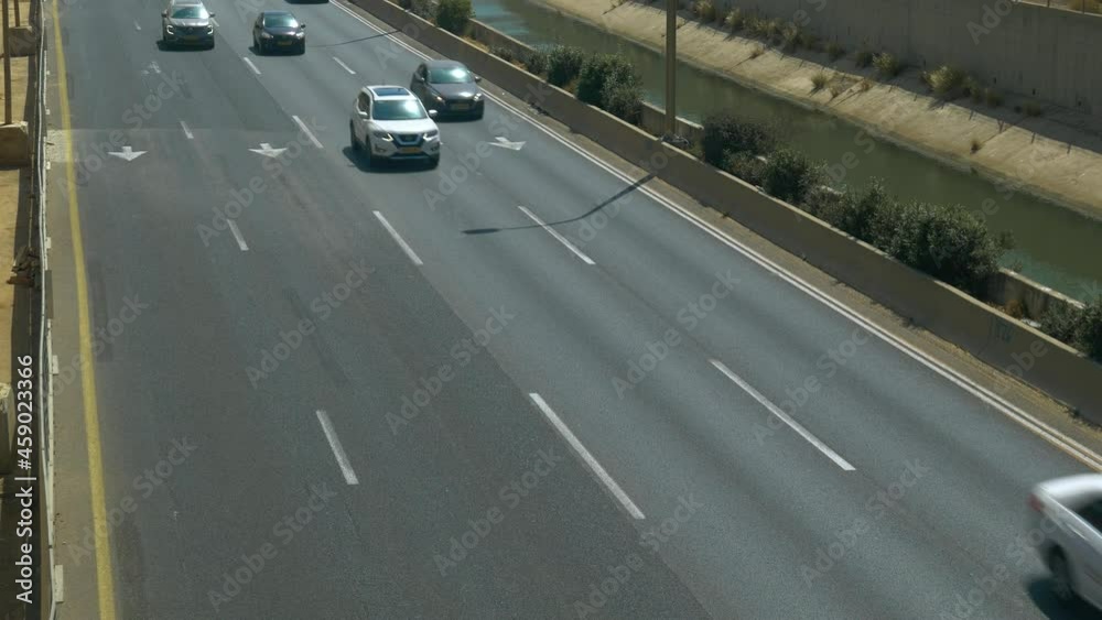 Traffic rush on a highway during midday Traffic rush on a highway during midday