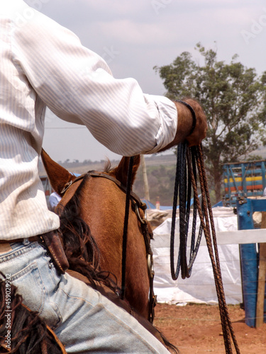 Campo Grande, Mato Grosso do Sul, September 23, 2006. Cowboys mounted on Quarter Horses prepare for the lasso test on a dirt track in the municipality of Campo Grande