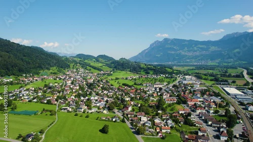Aerial view around the city Azmoos Wartau  in Switzerland on a sunny morning day in summer. photo