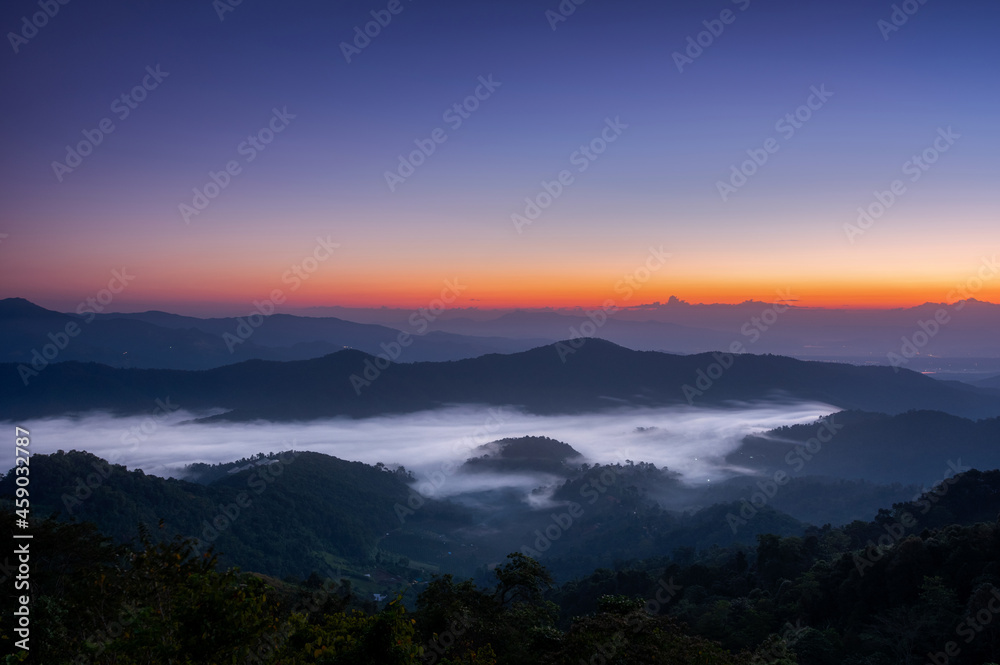Aerial view Beautiful of morning scenery sea of cloud and the fog flows on high mountains. Doi Montngo, Mae Taeng, Chiang Mai. THailand