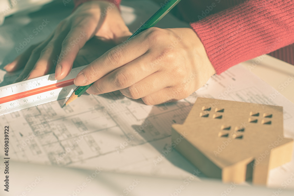 Architect working on blueprint. Architects workplace - architectural ...