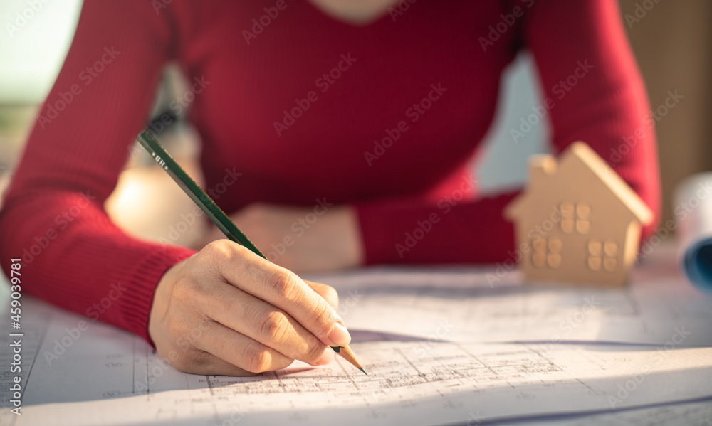 Architect working on blueprint. Architects workplace architectural